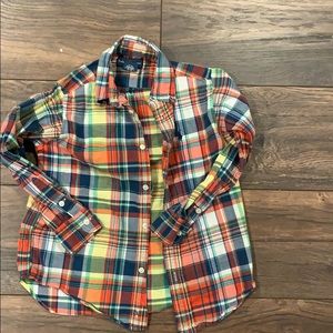 It’s formal plaid button down